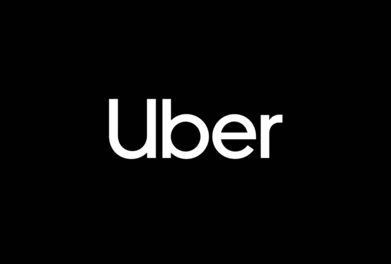 White Uber logo on black background